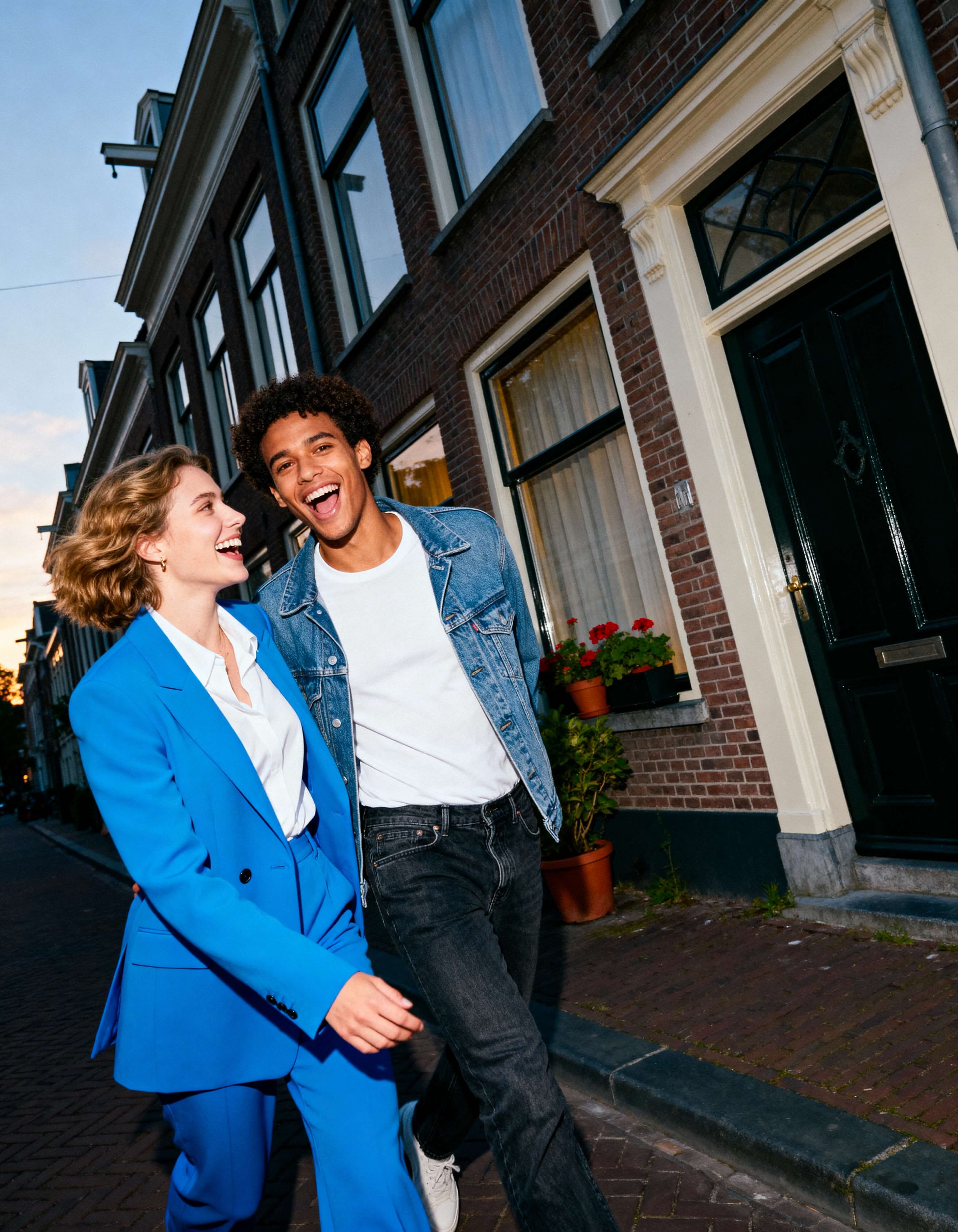 Couple in front of house